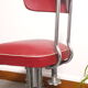 Chaise pivotante skaï bordeau 1960