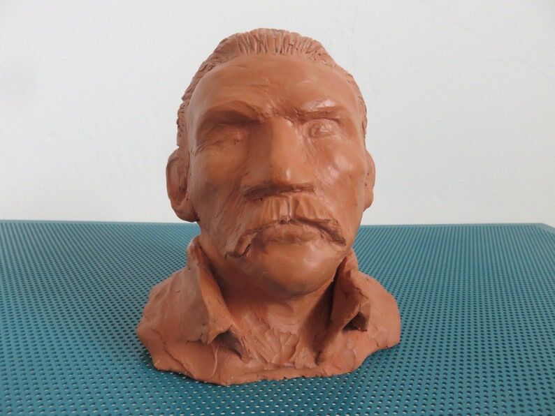 Ancient terracotta bust statue