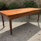 Table de ferme ancienne de style Louis Philippe en cerisier massif avec ses 2 allonges.