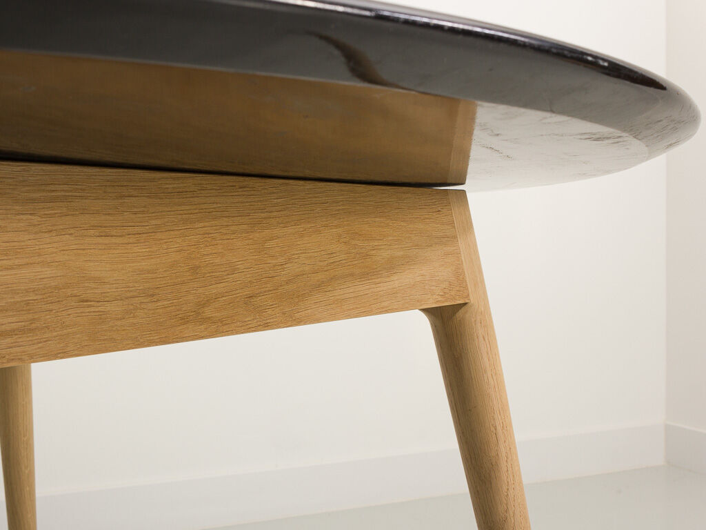 Round table, black lacquered top, solid oak base
