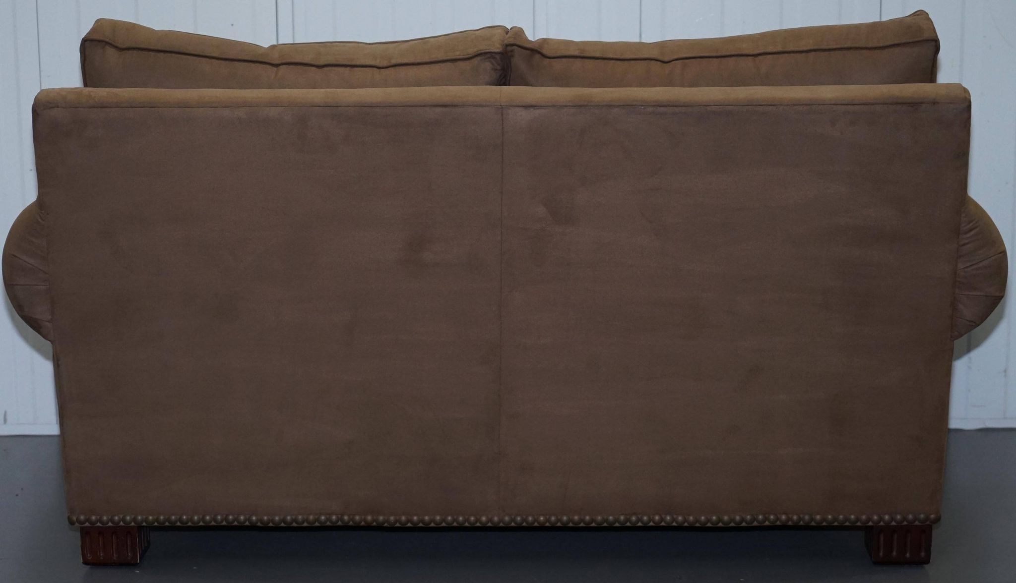 Ralph Lauren Jamaica velvet sofa pair with feather cushions.