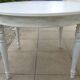 Round cherry wood table extendable to 210 cm without its extensions, completely refurbished.