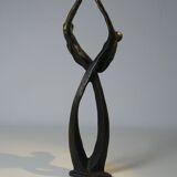 Tanned sculpture, "dancing couple". Signed M.N
