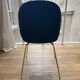 GUBI Beetle designer chair in midnight blue velvet with brass base