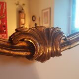 Mirror with golden mouldings