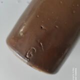 Bottle in varnished sandstone