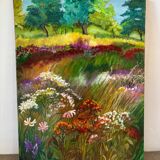 Flowers in a meadow signed