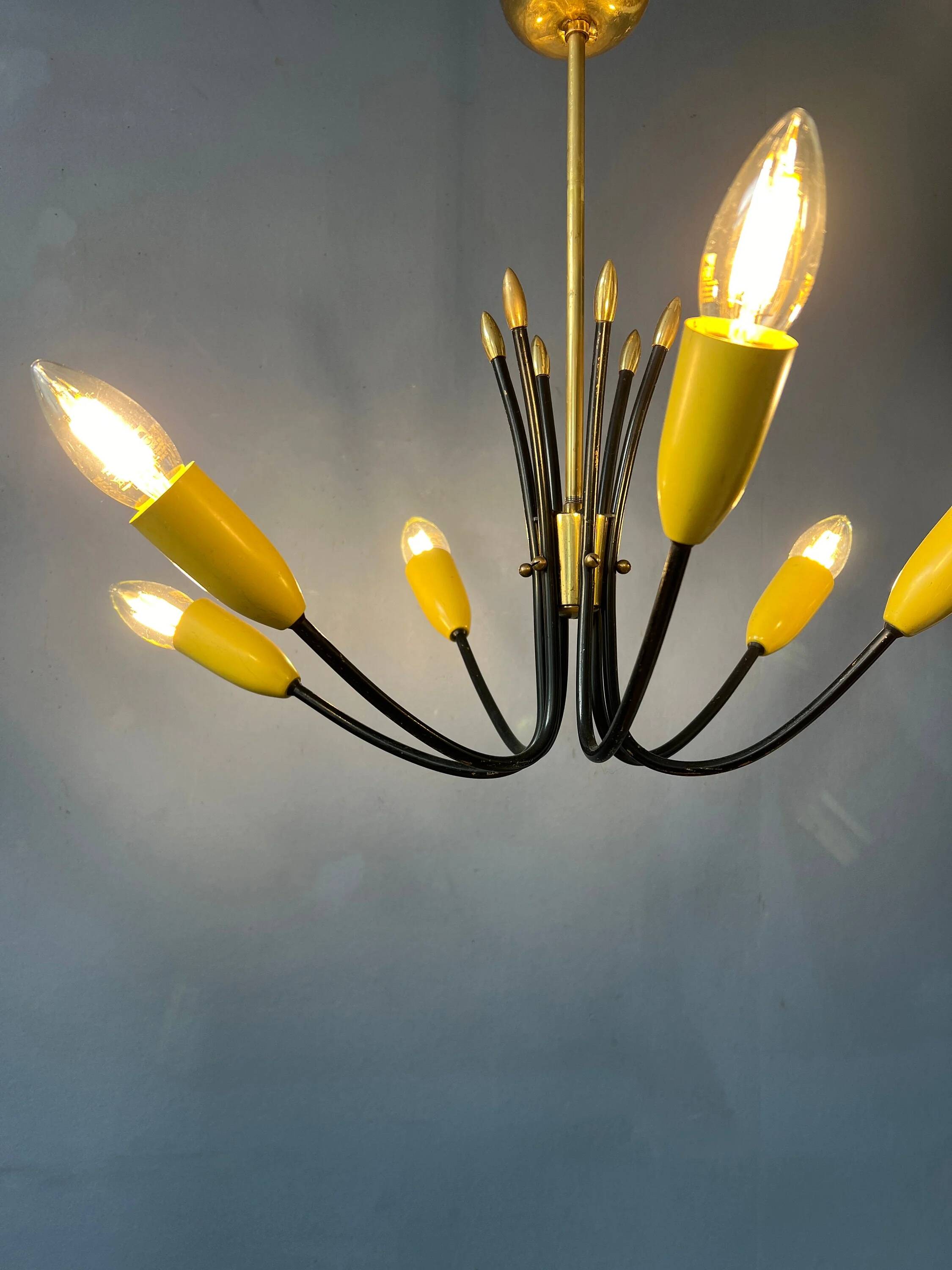 Vintage yellow spider suspension from the 1950s.