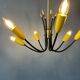Vintage yellow spider suspension from the 1950s.