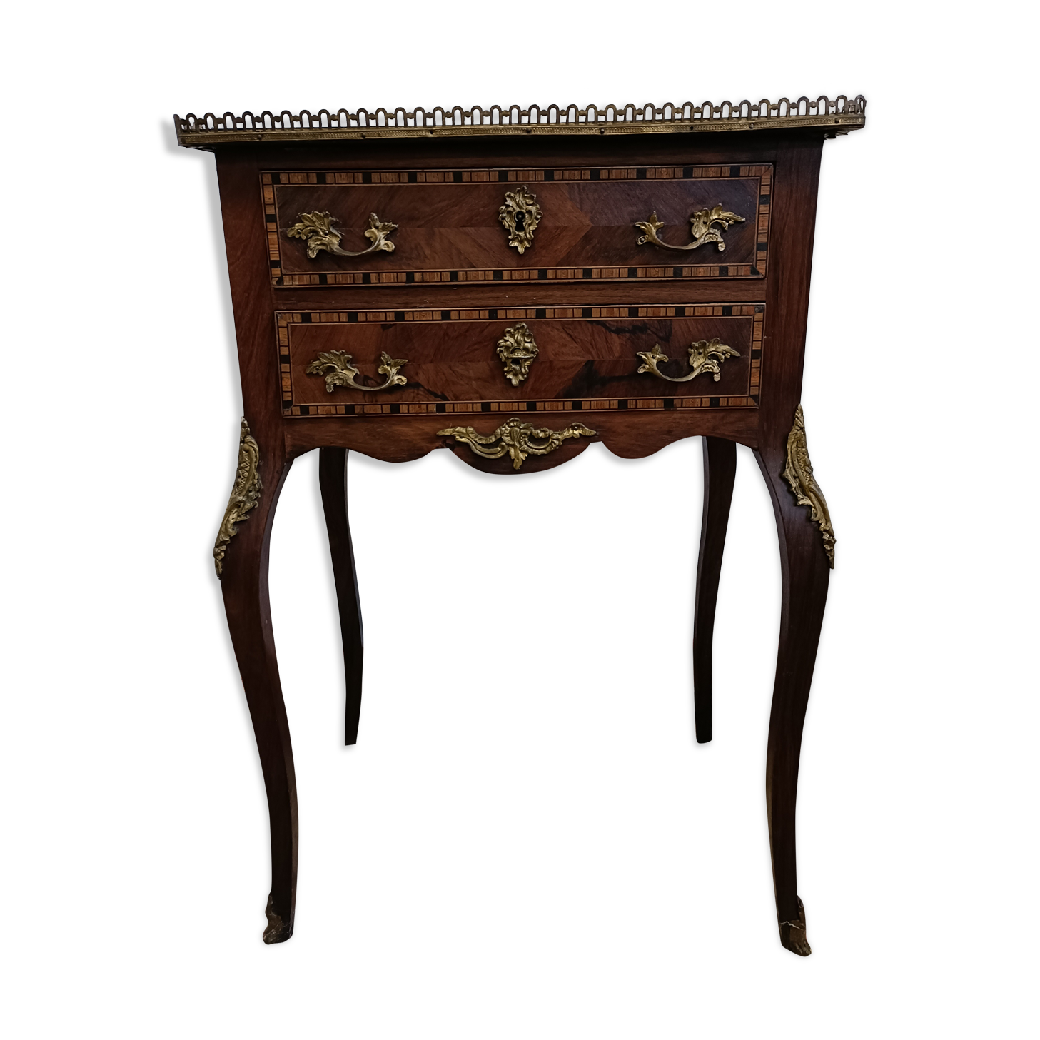 Small Louis XV chest of drawers in inlaid wood
