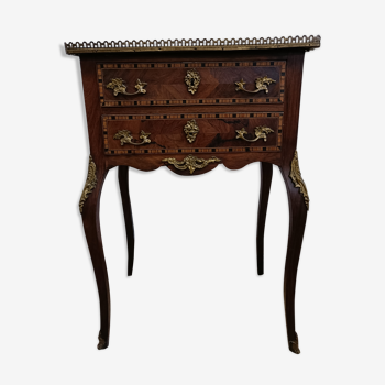 Small Louis XV chest of drawers in inlaid wood