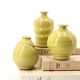 Trio of yellow ceramic vases, 70s