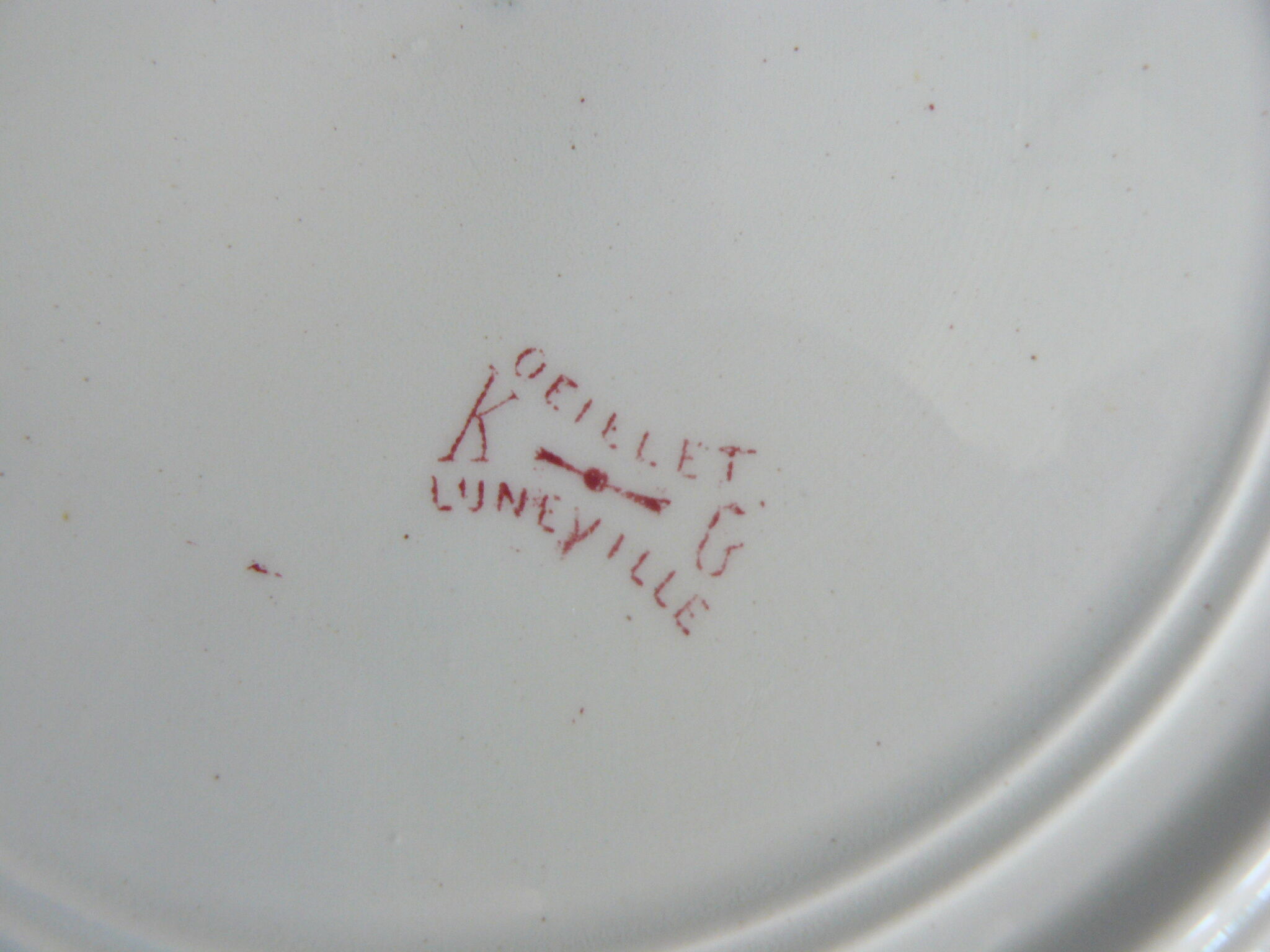 Round plate iron earth model "carnation" of Lunéville