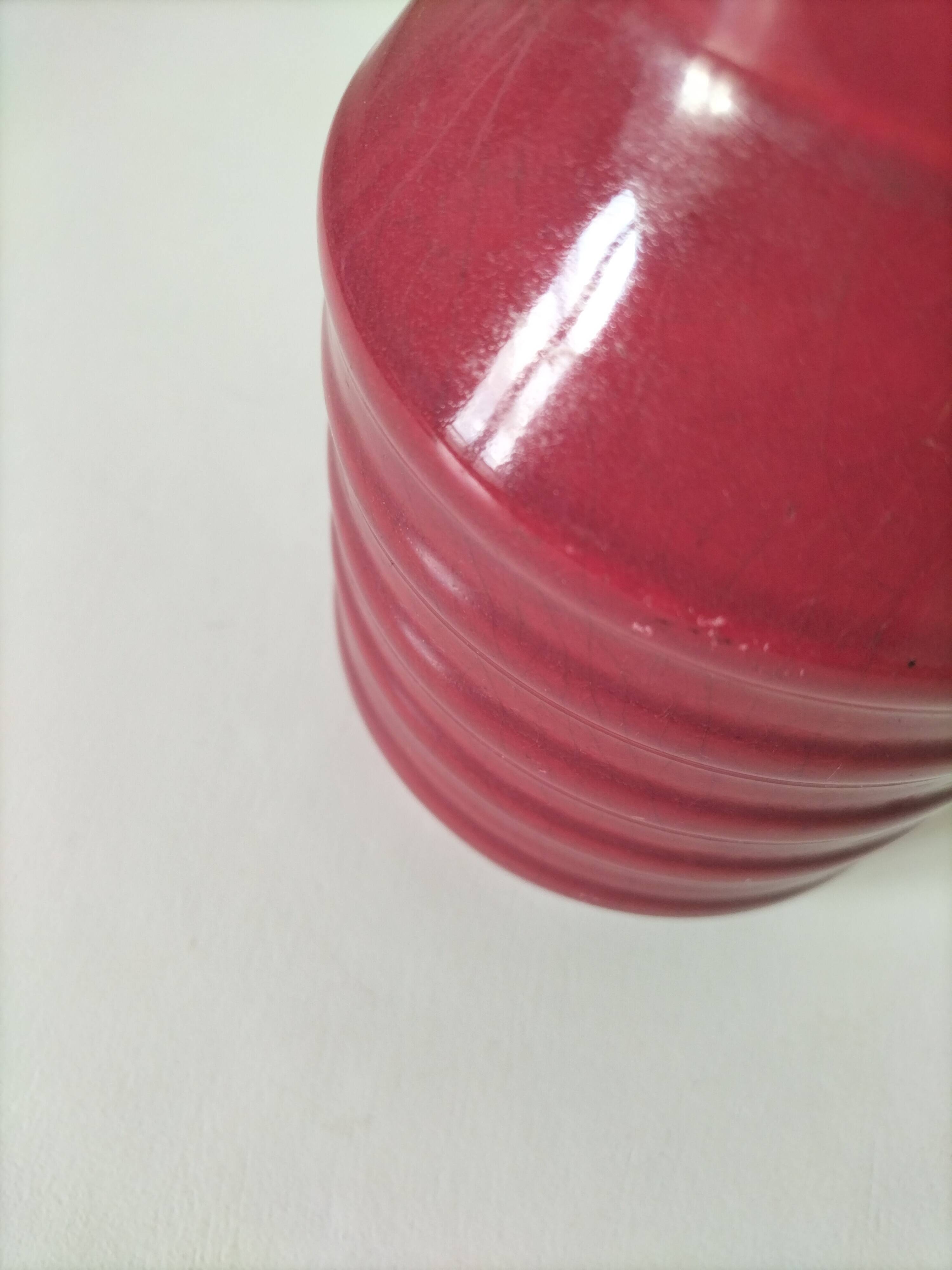 Old raspberry red pitcher from Onnaing, early 20th century.