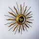 Brutalist sunburst ceiling light – gilt iron rays & exposed bulb, France, 1960s