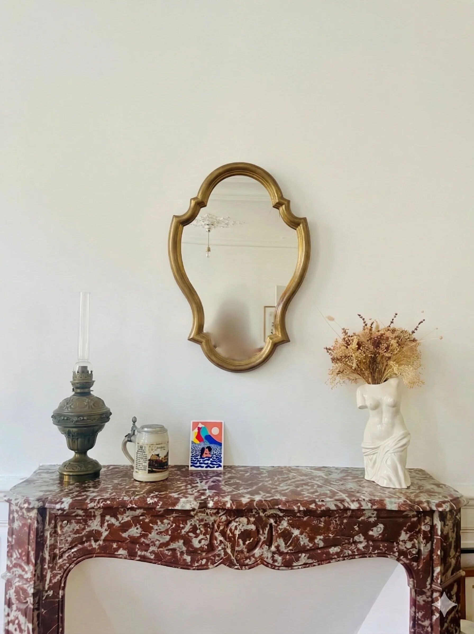 Baroque mirror in gilded wood