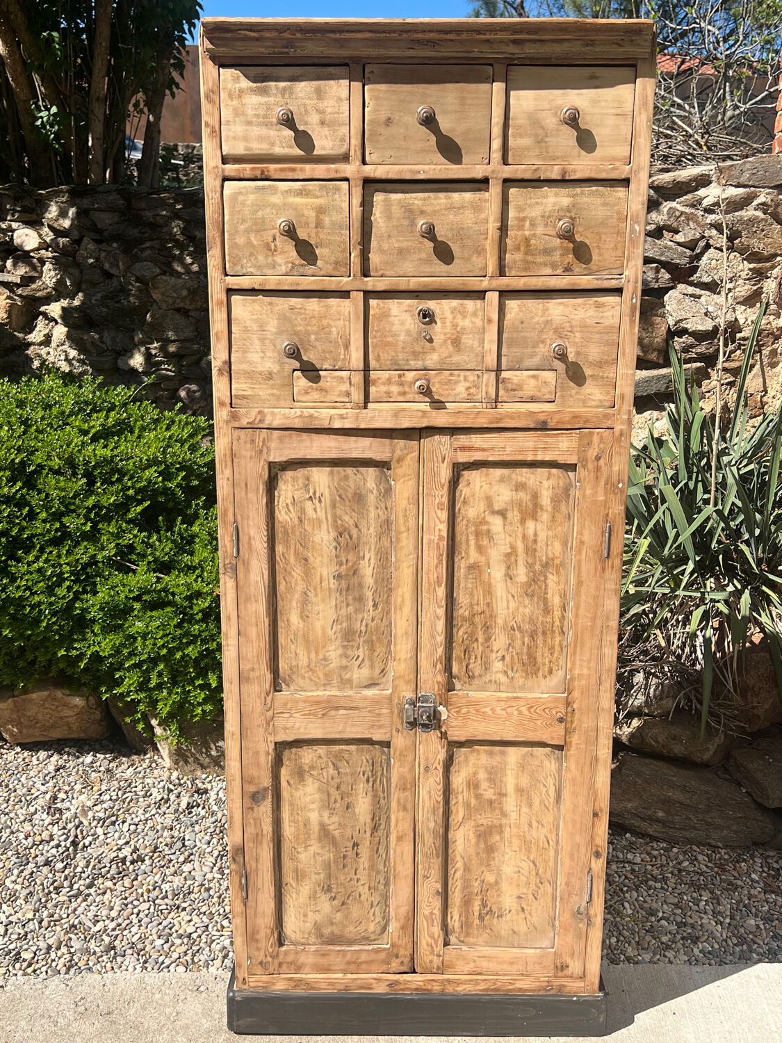 Beautiful piece of furniture with 8 drawers/2 doors in raw wood.