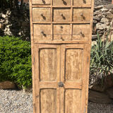 Beautiful piece of furniture with 8 drawers/2 doors in raw wood.