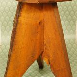 Brutalist stool tripod feet cross