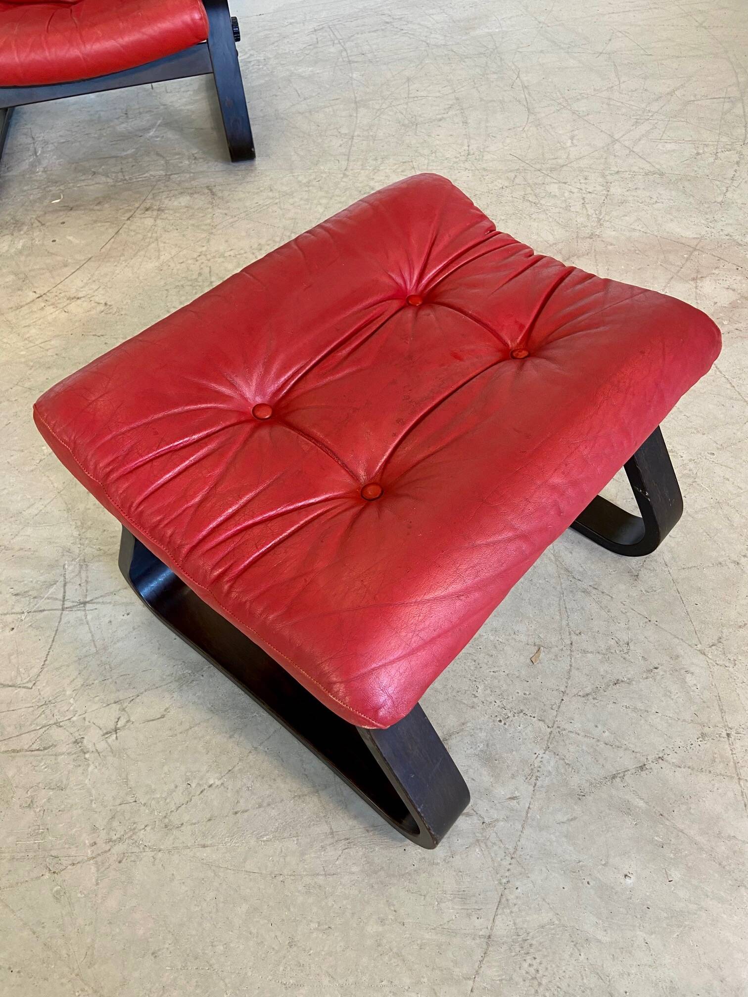 Vintage danish retro reclining lounge chair & stool in red leather by komfo