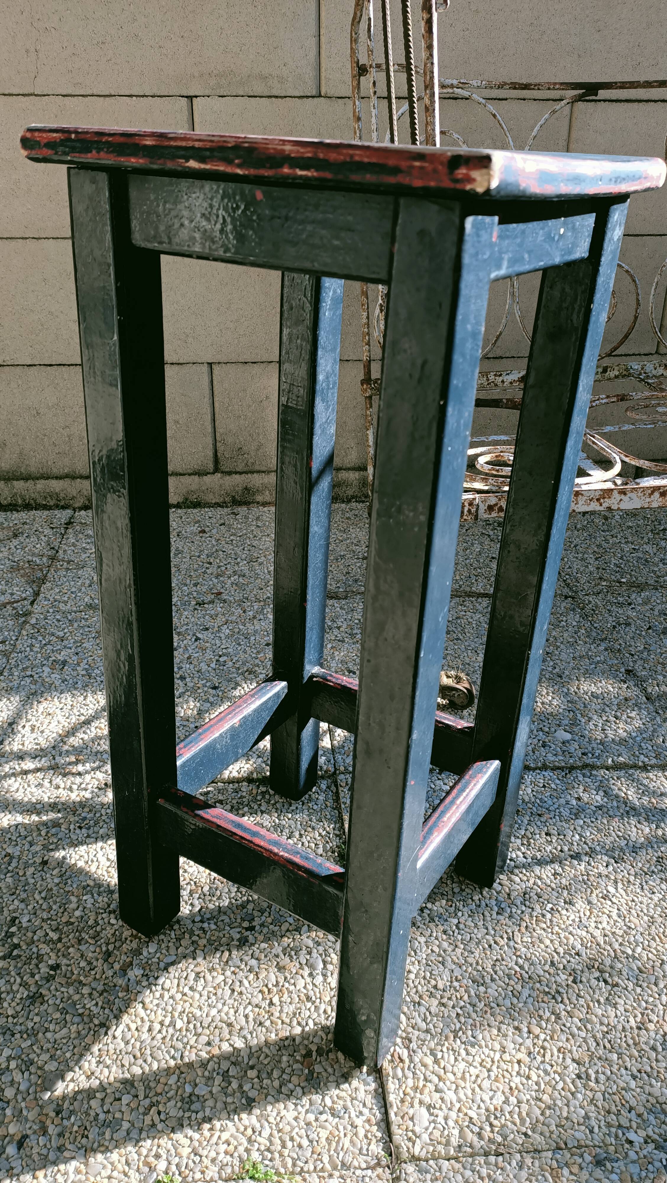 High patinated wooden stool