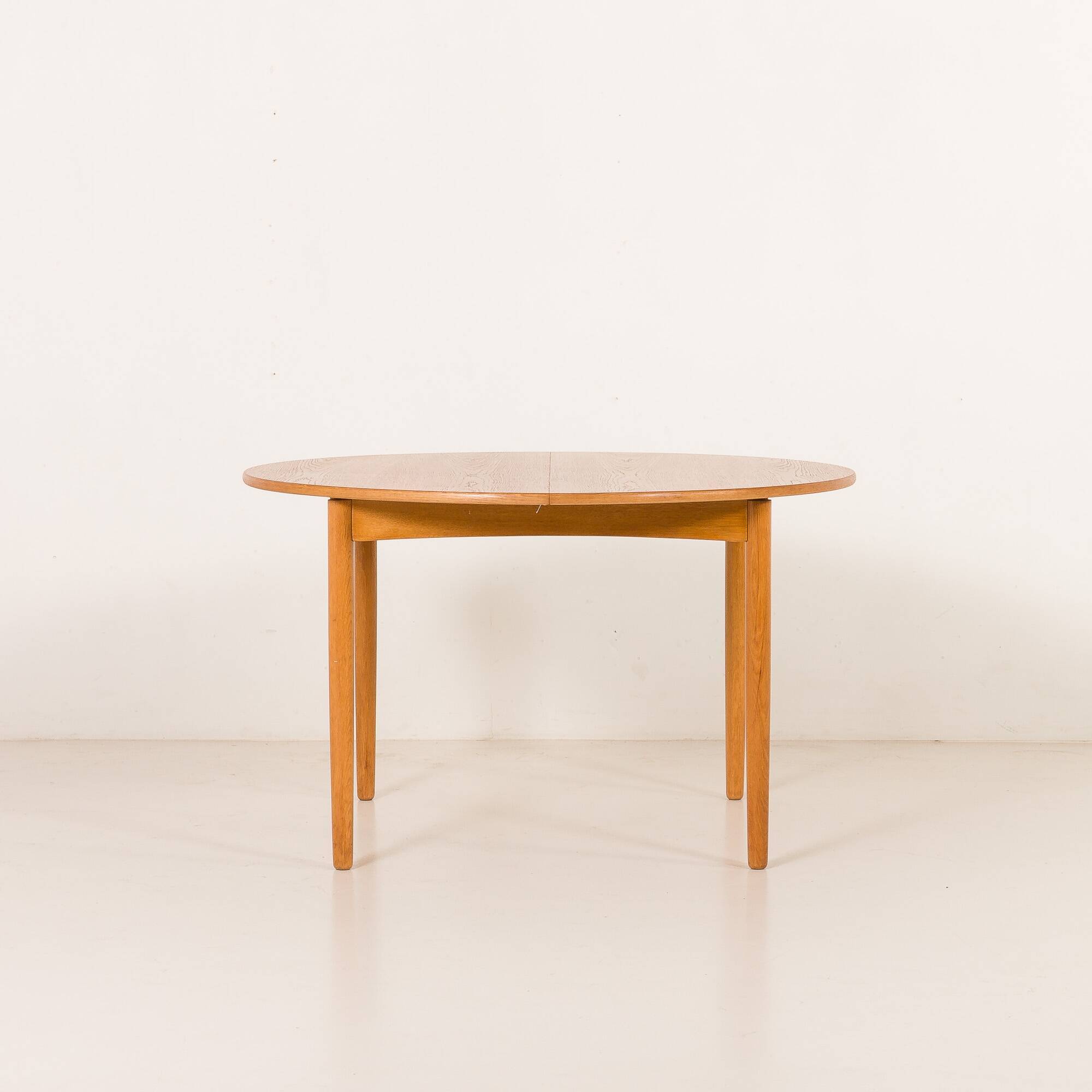 Danish Oak round dining table with one extension, 1970s