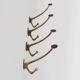 Set of 4 Adolf Loos brass art nouveau wall hooks, Vienna, Austria ca. 1910