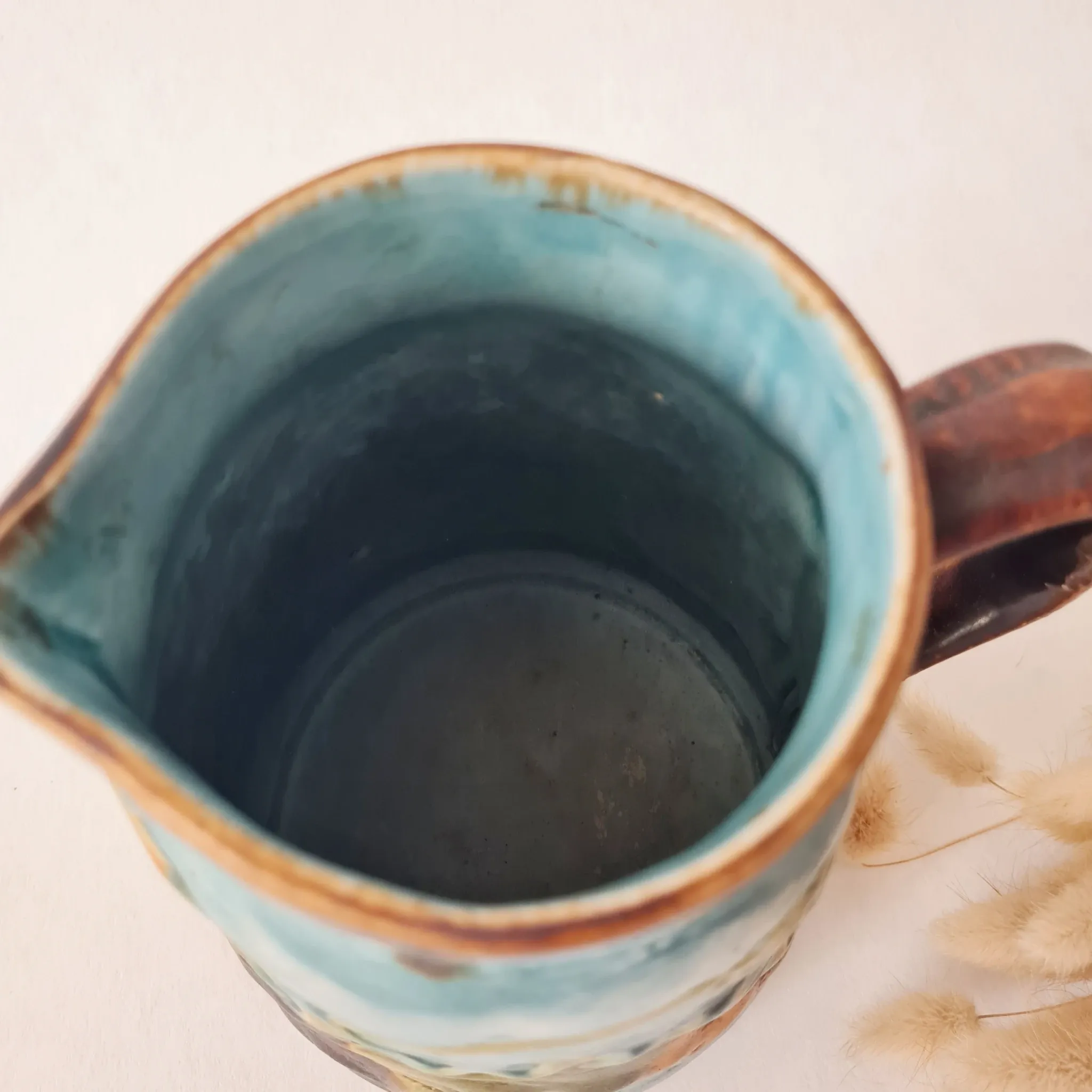 Old glazed stoneware pitcher - autumn