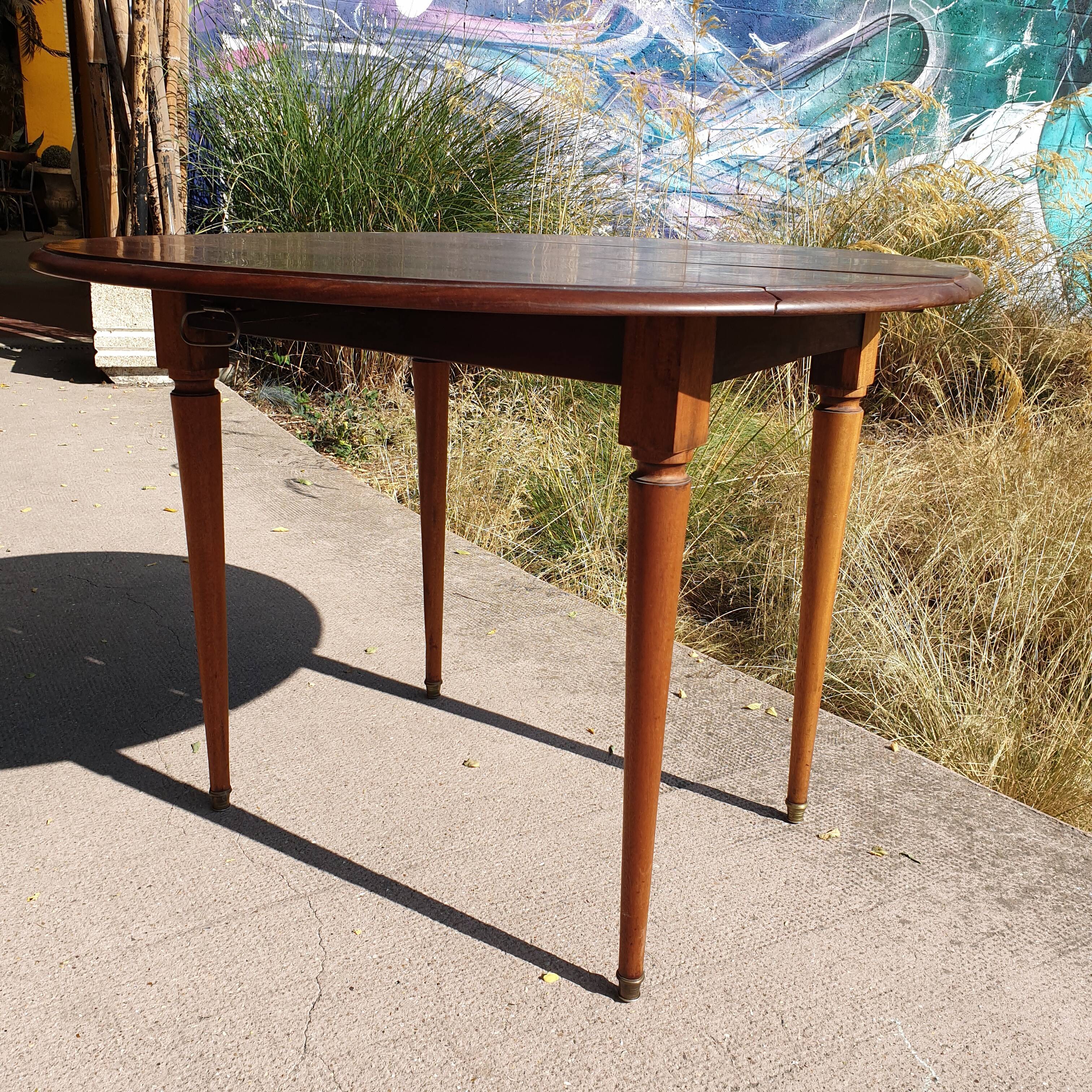 Old mahogany-shuttered round table