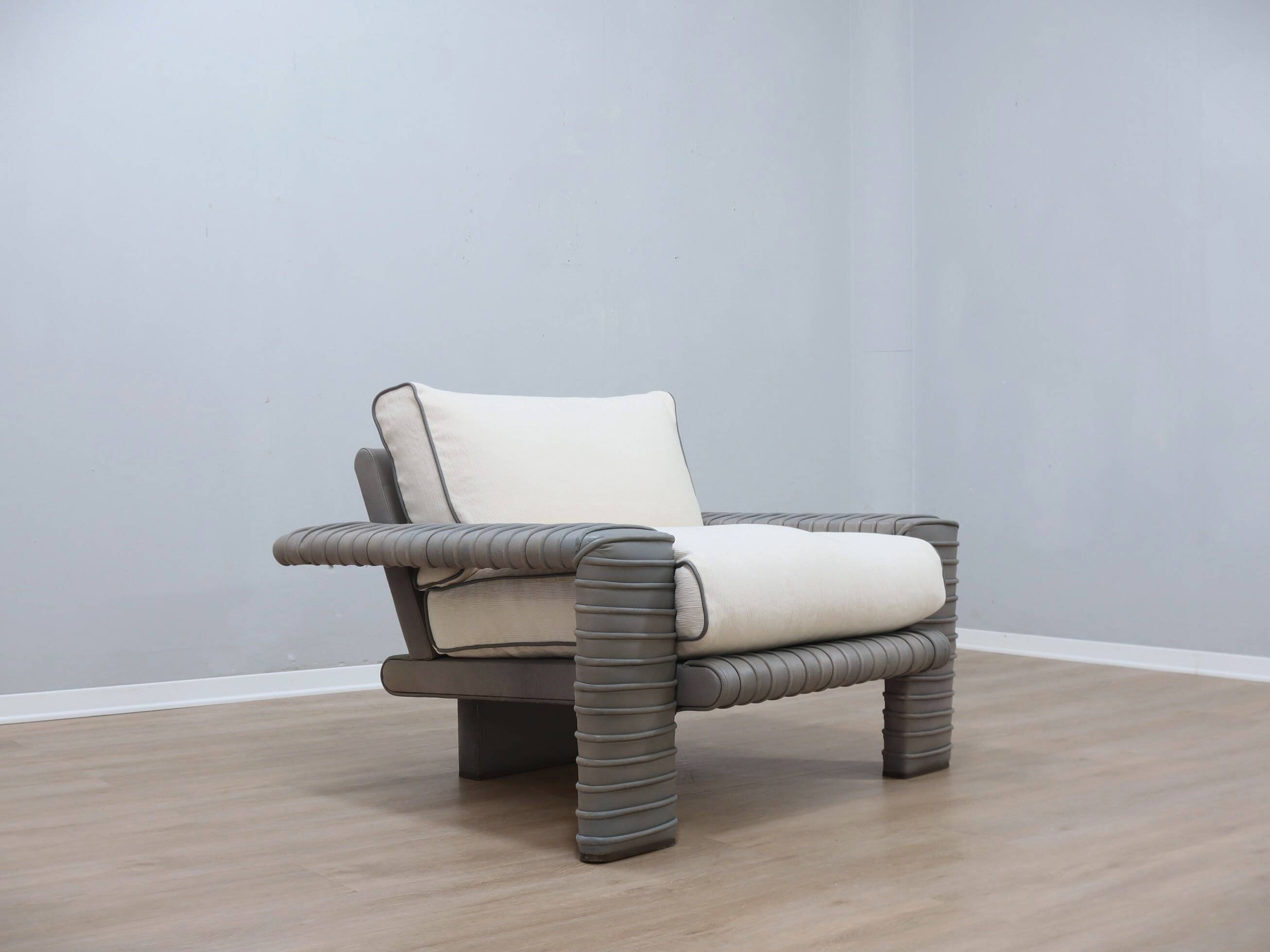 Marzio Cecchi armchair in ribbed Leather and goose down cushions 1970s