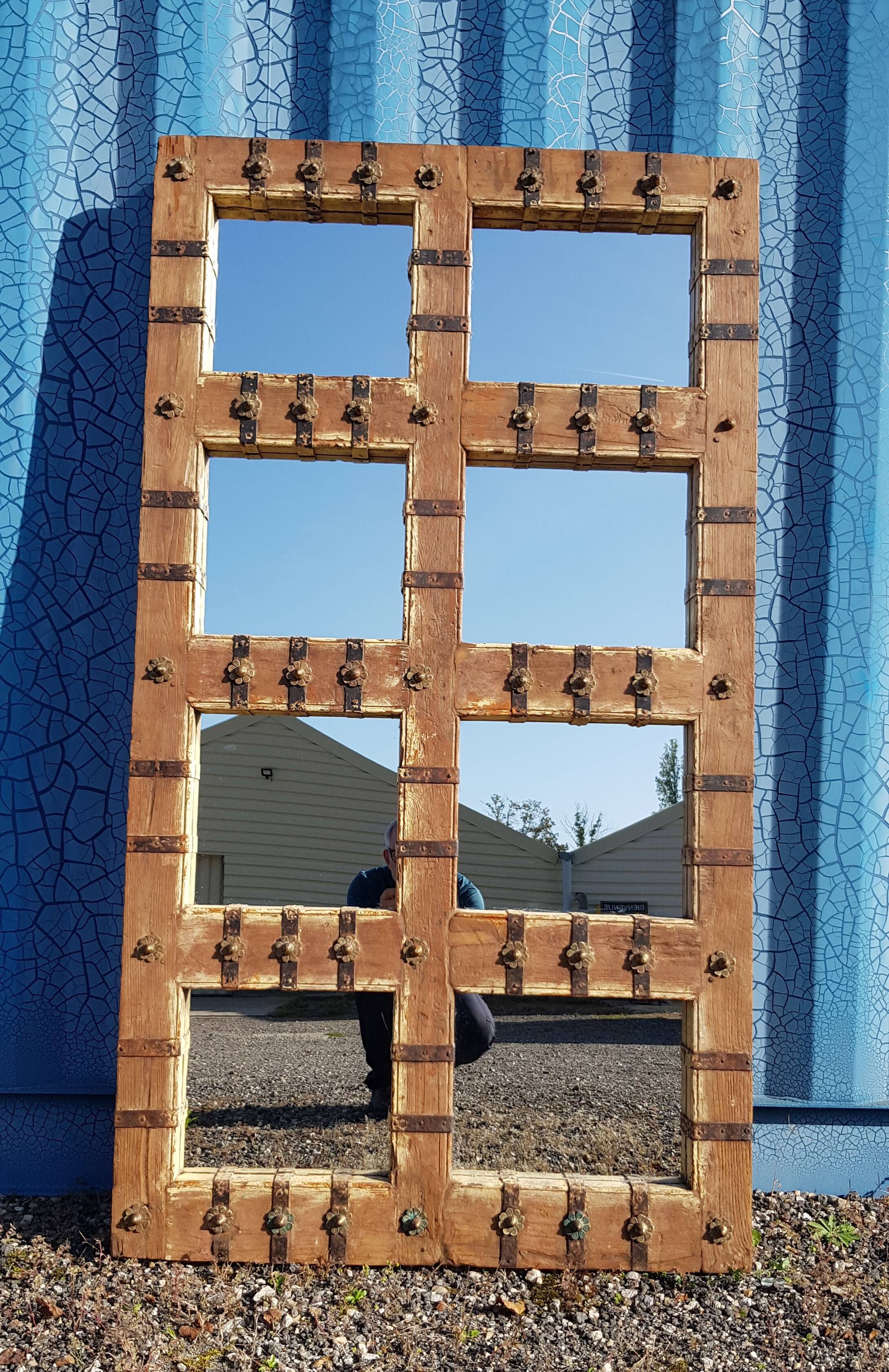 Old Burmese teak mirror with copper fittings