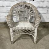 Vintage white rattan armchair