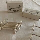 12 knife holders with metal bead decoration