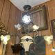 19th century brass and bronze chandelier, Napoleon III, illuminated by 6 tulips and a central globe