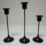 Three Scandinavian black lacquered metal candle holders