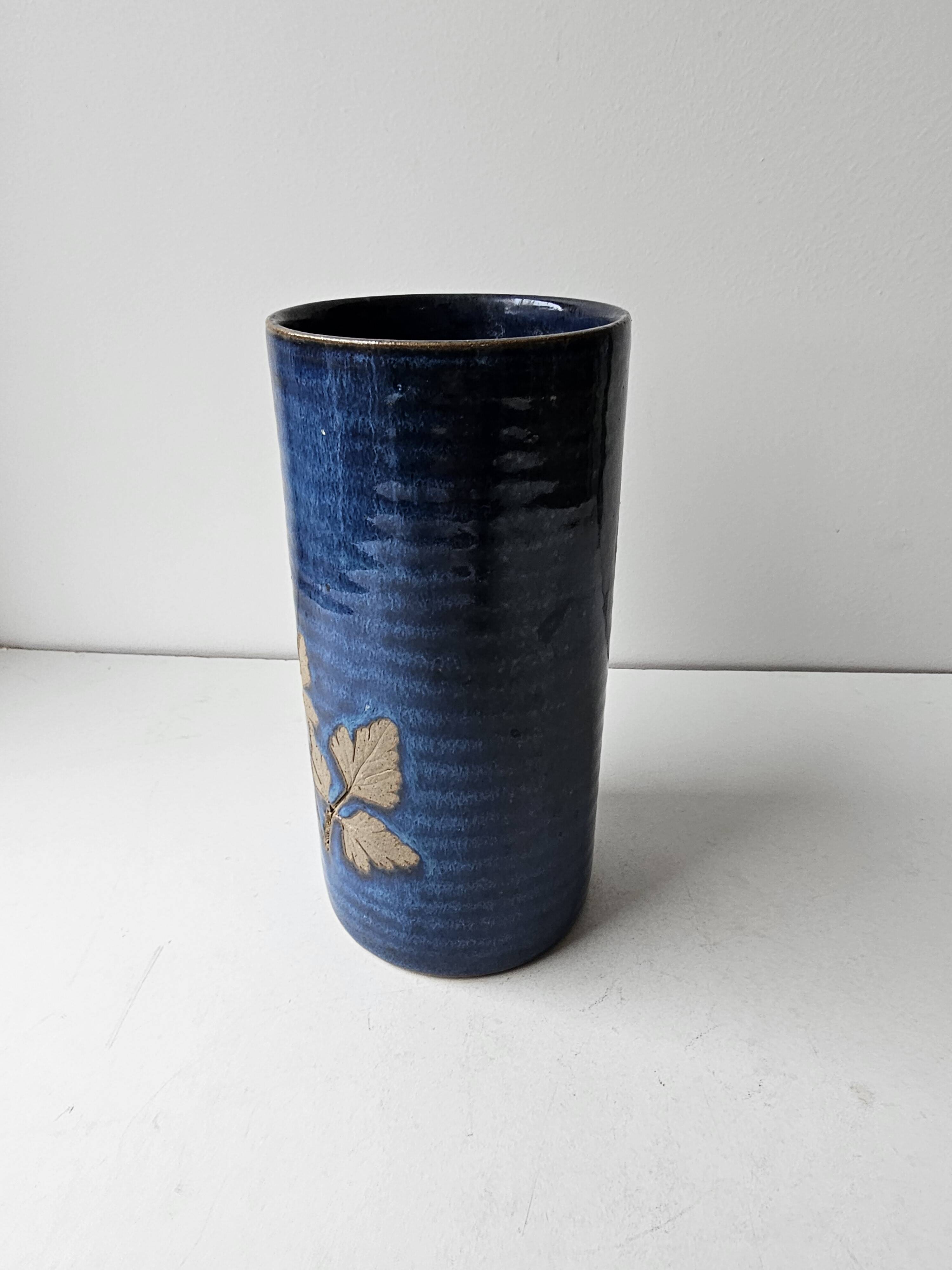 Blue ceramic vase with roller signed AB (signature to be identified)