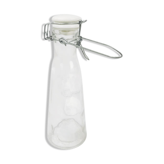 Glass bottle with clasp