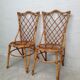 Pair of rattan chairs by Louis Sognot
