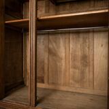 Old solid wood wardrobe with three vintage mirror doors