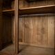 Old solid wood wardrobe with three vintage mirror doors