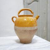 Old gargoulette pot in glazed terracotta