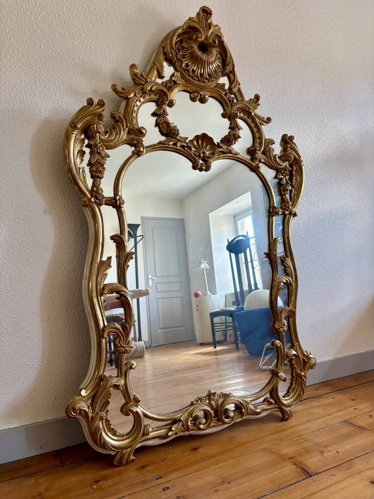 Large gold mirror in Louis XV style