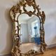 Large gold mirror in Louis XV style