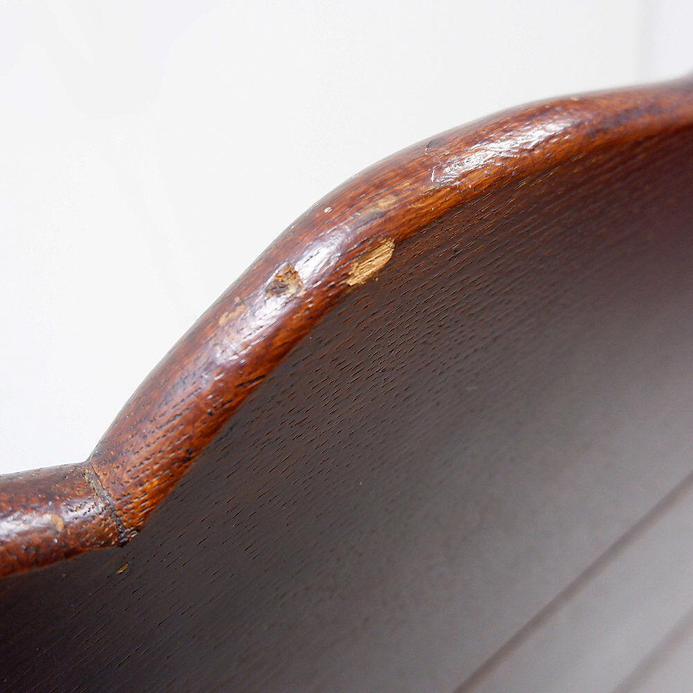Vintage solid wood church bench from the 20th century.