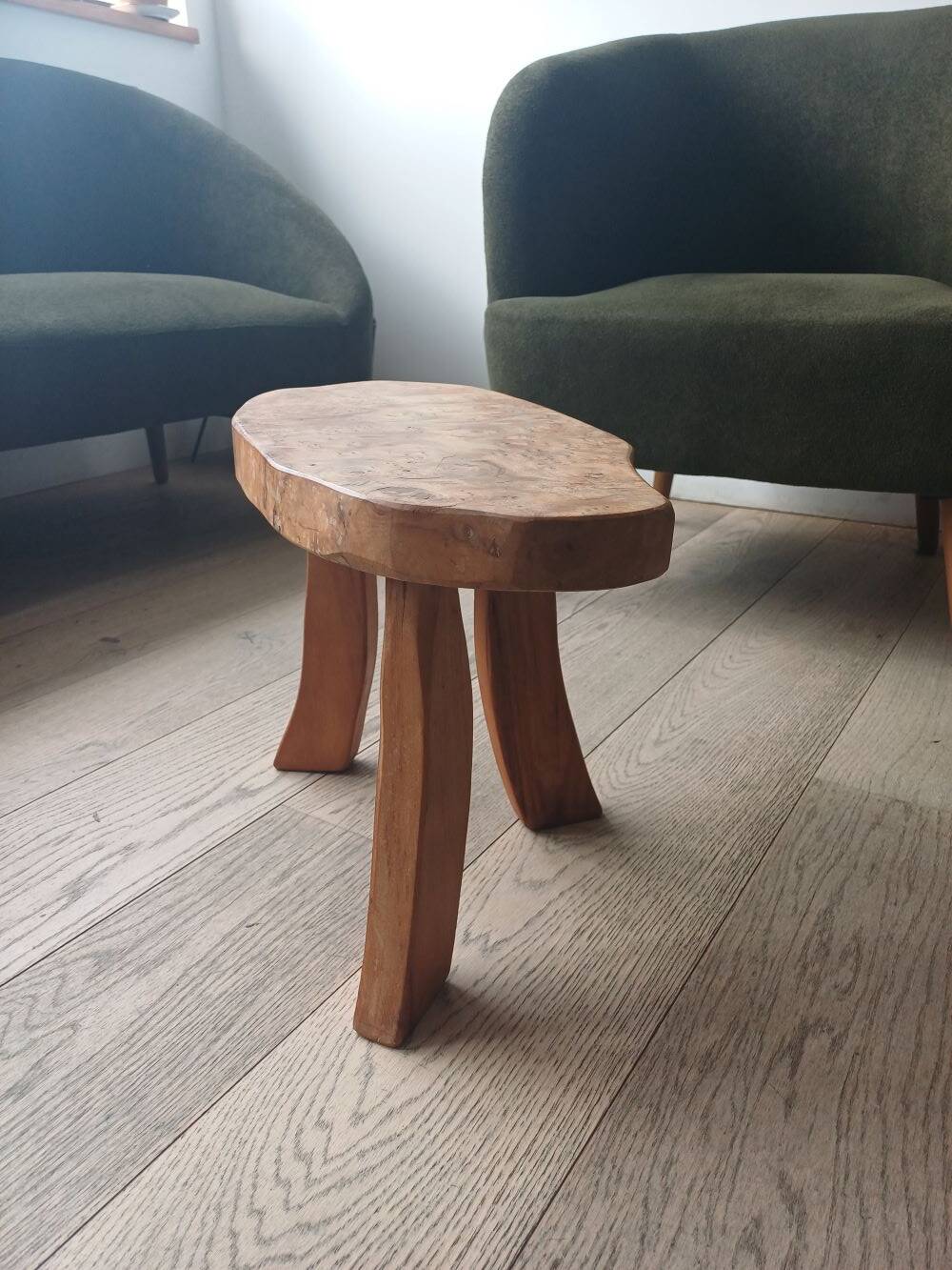 brutalist tripod stool in solid elm