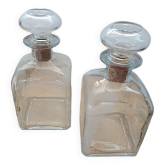 2 vintage glass carafes / bottles