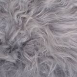 Danish Mid-century Modern stool reupholstered in grey sheep skin