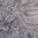 Danish Mid-century Modern stool reupholstered in grey sheep skin