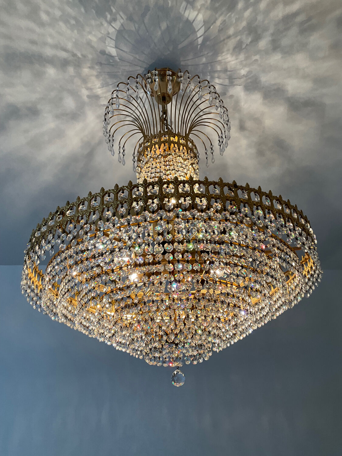 Brass chandelier and crystal tassel waterfall