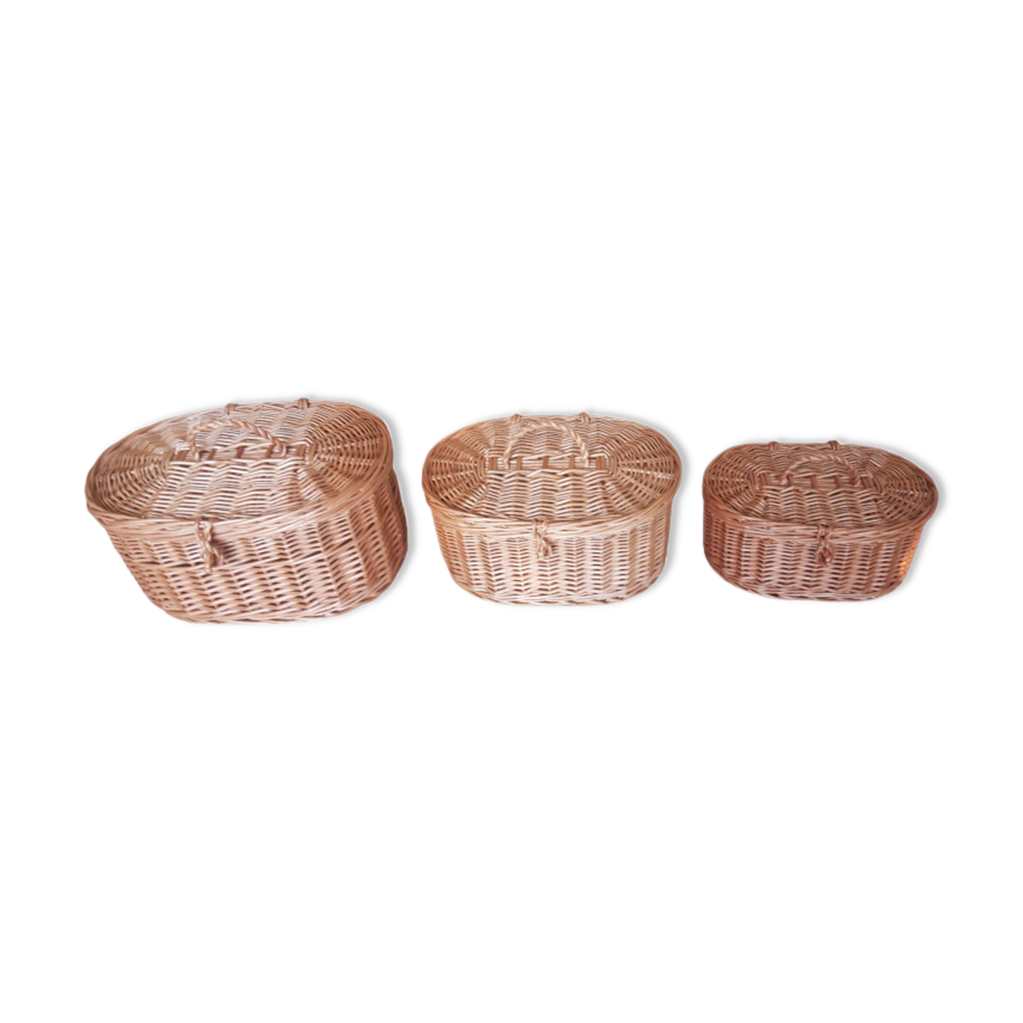 Three wicker boxes